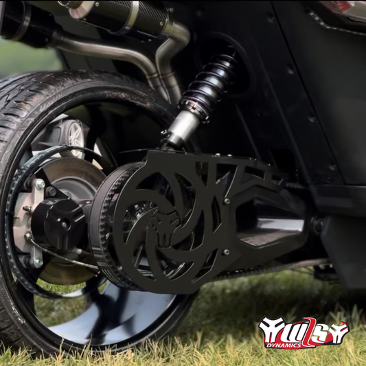 Close-up of a motorcycle's suspension system with 'TWIST DYNAMICS' branding.
